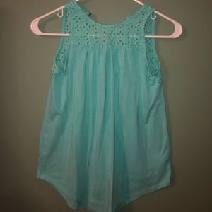 Teal tank top with flowers on top